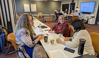 tekom Europe delegates working in groups on their workshop topics